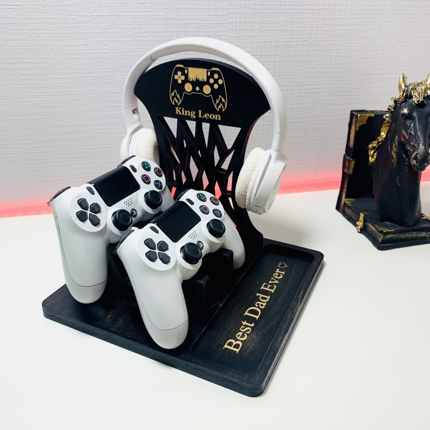 Black Colour Wood Controller Stand and headphone holder, ps5 controller stand, ps5 controller holder, xbox controller holder, xbox controller stand, gaming room accessories for game room setup, headphone holder, headphone stand, headset holder, headset stand, game room game ideas teen boy or for adults. Personalized for Fathers day gifts with ''Best Dad Ever'' and Gamer tag.